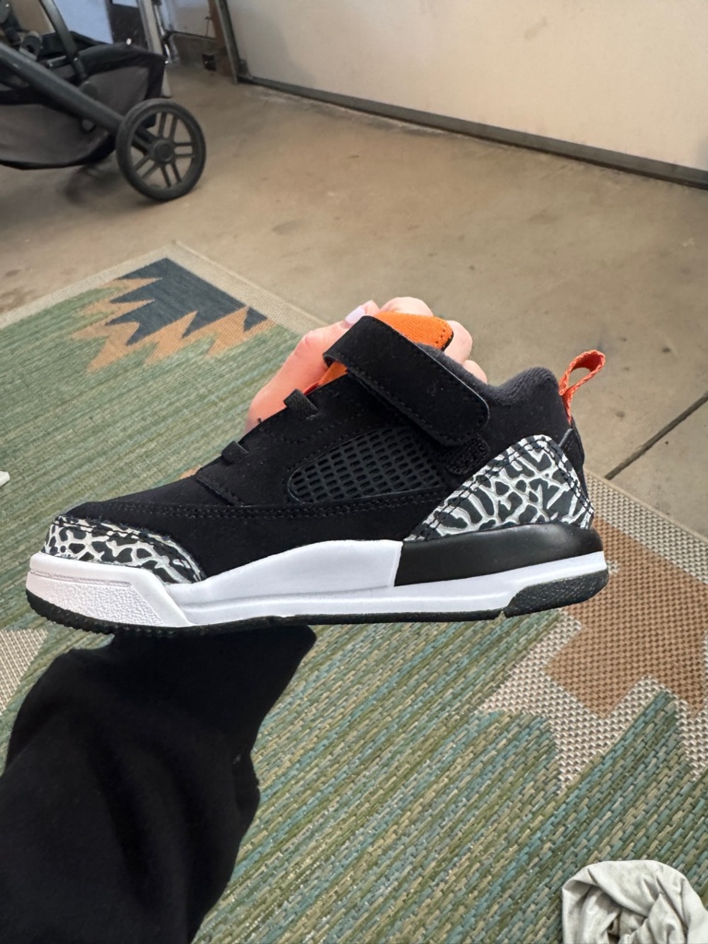 Nike Black and Orange Kids' Sneakers with White and Grey Pattern